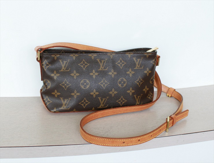 Louis Vuitton e Crossbody Bag - Brown Crossbody Bags