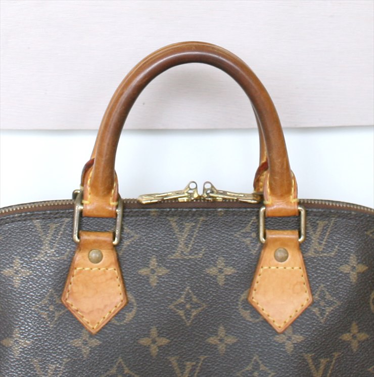 lv alma monogram price