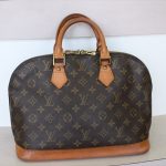 LOUIS VUITTON ALMA Monogram Handbag