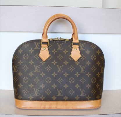 LOUIS VUITTON ALMA Monogram Handbag