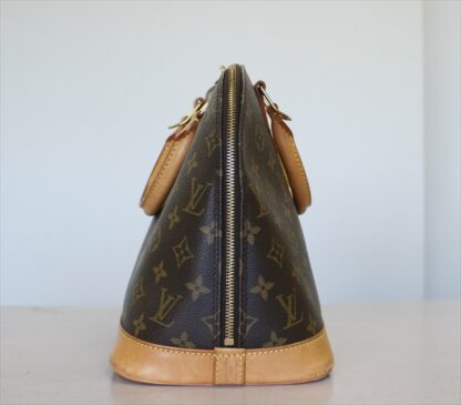 LOUIS VUITTON ALMA Monogram Handbag