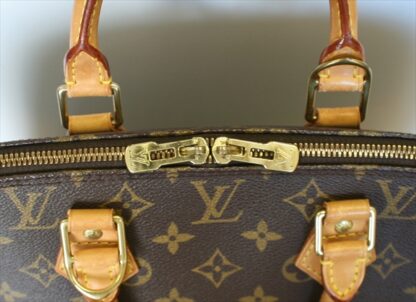 LOUIS VUITTON ALMA Monogram Handbag